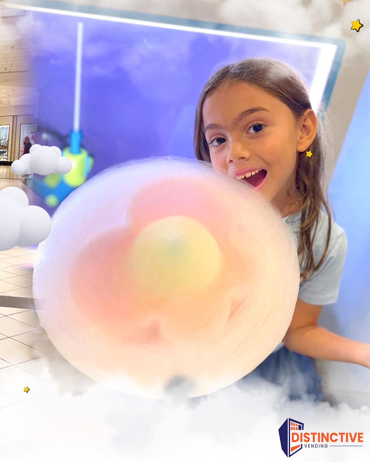 little girl holding heart shaped cotton candy